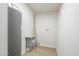 Functional utility room with essential equipment, providing efficient space for laundry and storage needs at 562 N 104Th St, Mesa, AZ 85207