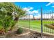 Beautiful backyard view looking out to a golf course, with a privacy fence and desert landscaping at 6202 E Mckellips Rd # 46, Mesa, AZ 85215