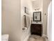 Stylish bathroom featuring a vanity with modern fixtures and a framed mirror and neutral color palette at 6202 E Mckellips Rd # 46, Mesa, AZ 85215