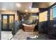 Stunning bathroom features a copper soaking tub, natural light and modern fixtures at 10471 E White Feather Ln, Scottsdale, AZ 85262