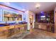 Unique bathroom features dual vanities, decorative lighting, and views to the outdoors at 10471 E White Feather Ln, Scottsdale, AZ 85262