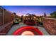 Backyard hot tub with nearby lounge area at 10471 E White Feather Ln, Scottsdale, AZ 85262