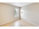 Comfortable bedroom featuring tile flooring, a window for natural light, and neutral wall color at 1051 S Dobson Rd # 117, Mesa, AZ 85202