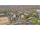 Panoramic aerial view displays the community, surrounding roads, and nearby amenities at 14950 W Mountain View Blvd # 3105, Surprise, AZ 85374