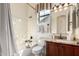 Bathroom with a tub and granite counter vanity at 1631 N Lynch --, Mesa, AZ 85207