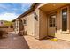 Home exterior with a brick fireplace, pavers, and a covered front entry exudes curb appeal at 1631 N Lynch --, Mesa, AZ 85207