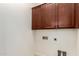 Laundry room with brown cabinets at 1631 N Lynch --, Mesa, AZ 85207