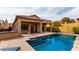 Sparkling pool with steps and a Baja shelf offers a refreshing retreat in the backyard at 1631 N Lynch --, Mesa, AZ 85207