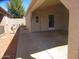 Spacious carport with a door, decorative security door, and ample covered parking space at 1720 E Augusta Ave, Chandler, AZ 85249