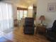 Inviting living room featuring comfortable seating and natural light with a view into the dining area at 1720 E Augusta Ave, Chandler, AZ 85249