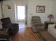 Comfortable living room with laminate flooring and neutral decor at 1720 E Augusta Ave, Chandler, AZ 85249