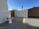 Backyard gate with desert landscaping, perfect for maintaining privacy and enjoying the Arizona climate at 19045 N 45Th Ave, Glendale, AZ 85308