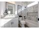 Chic bathroom featuring a modern vanity, stylish mirror, bathtub and decorative tile backsplash at 1920 E Creek Canyon Rd, Phoenix, AZ 85086