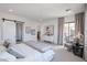 Comfortable bedroom with a sliding barn door and serene outdoor views at 1920 E Creek Canyon Rd, Phoenix, AZ 85086