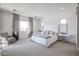 Serene bedroom showcasing a plush bed, stylish chair, and minimalist décor at 1920 E Creek Canyon Rd, Phoenix, AZ 85086