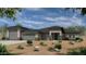 Stunning modern home with desert landscaping and a spacious three-car garage at 1920 E Creek Canyon Rd, Phoenix, AZ 85086