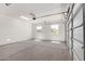 Spacious two car garage with windows providing natural light at 23769 N 163Rd Dr, Surprise, AZ 85387
