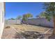 A backyard view features gravel landscaping and block wall at 36217 N Urika Dr, San Tan Valley, AZ 85140