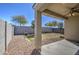 A backyard view features gravel landscaping and block wall at 36217 N Urika Dr, San Tan Valley, AZ 85140