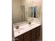 Modern bathroom featuring double sinks, custom cabinetry, and decorative mirrors with great lighting for everyday routines at 36217 N Urika Dr, San Tan Valley, AZ 85140