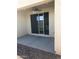 Relaxing covered patio featuring a ceiling fan, tiled floor, and backyard view at 36217 N Urika Dr, San Tan Valley, AZ 85140