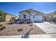 Charming single story home with a well-manicured gravel yard at 36217 N Urika Dr, San Tan Valley, AZ 85140