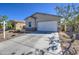 Charming single story home with a well-manicured gravel yard at 36217 N Urika Dr, San Tan Valley, AZ 85140