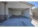 Spacious two car garage with water heater against the back wall at 36217 N Urika Dr, San Tan Valley, AZ 85140