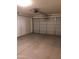 Clean, spacious garage with ample room for parking and storage at 36217 N Urika Dr, San Tan Valley, AZ 85140