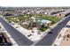 Aerial view showcasing community amenities, including a pool, playground, green spaces, and surrounding homes at 4156 E Bernice St, Gilbert, AZ 85295