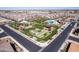 Aerial view of neighborhood, showing pool, basketball court, park, and surrounding houses at 4156 E Bernice St, Gilbert, AZ 85295