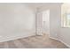 Neutral bedroom features a neutral carpet and a door leading to a walk-in closet at 4156 E Bernice St, Gilbert, AZ 85295