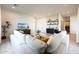 Stylish living room showcasing a comfortable sectional sofa, a wet bar and modern decor at 610 E Woburn Ln, Phoenix, AZ 85085