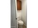 Cozy bathroom features a toilet with a cabinet mounted overhead for extra storage at 7401 W Arrowhead Clubhouse W Dr # 1015, Glendale, AZ 85308