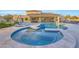 Resort-style backyard pool with a baja step and in-ground hot tub at 7481 E Camino Santo --, Scottsdale, AZ 85260