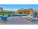 Gorgeous backyard pool with sun loungers, spa, and a well-manicured lawn at 7481 E Camino Santo --, Scottsdale, AZ 85260