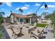 Inviting backyard featuring a fire pit, patio seating, and string lights at 8781 S Mill Ave, Tempe, AZ 85284