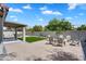 Paver patio offers a seating area and lush backyard views at 8781 S Mill Ave, Tempe, AZ 85284