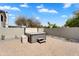 Private backyard with pavers features a hot tub and desert landscaping at 8781 S Mill Ave, Tempe, AZ 85284