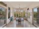 Bright breakfast nook features an round table and chairs with beautiful views of the outdoors at 10040 E Happy Valley Rd # 269, Scottsdale, AZ 85255