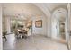 Dining room showcases tile flooring and an archway to another room at 10040 E Happy Valley Rd # 269, Scottsdale, AZ 85255