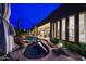 The backyard has a pristine pool, spa and gorgeous, mature landscaping at 10040 E Happy Valley Rd # 269, Scottsdale, AZ 85255