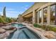 Luxury home featuring a custom pool, spa and beautifully landscaped backyard at 10040 E Happy Valley Rd # 269, Scottsdale, AZ 85255