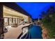 Backyard oasis featuring a custom pool with waterfall and outdoor seating, perfect for entertaining at 10040 E Happy Valley Rd # 269, Scottsdale, AZ 85255