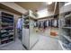 Organized walk-in closet featuring custom shelving and ample storage at 10040 E Happy Valley Rd # 269, Scottsdale, AZ 85255