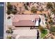 Features low-maintenance desert landscaping and is perfect for entertaining or relaxing in the backyard at 10134 E Meandering Trail Ln, Gold Canyon, AZ 85118