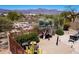Fenced backyard with desert landscaping featuring a Yucca tree, cacti and seating areas at 10134 E Meandering Trail Ln, Gold Canyon, AZ 85118