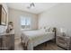 Cozy bedroom with great natural light and matching nightstands and dressers at 10134 E Meandering Trail Ln, Gold Canyon, AZ 85118