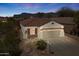 Charming single-Gathering home with a tile roof, desert landscaping, and a two-car garage at 10134 E Meandering Trail Ln, Gold Canyon, AZ 85118
