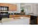 Close-up of the spacious kitchen island with built-in microwave and plenty of counter space at 10134 E Meandering Trail Ln, Gold Canyon, AZ 85118